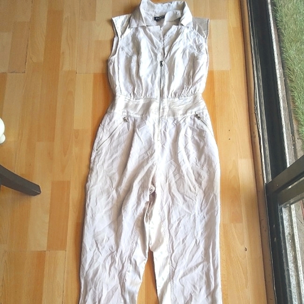 Bebe white and silver jumpsuit